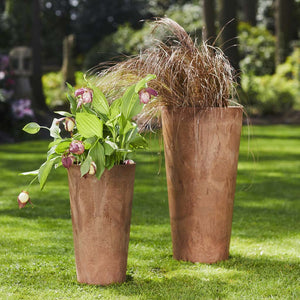Claire Artstone Tall Planter - Oak With Plants On Lawn