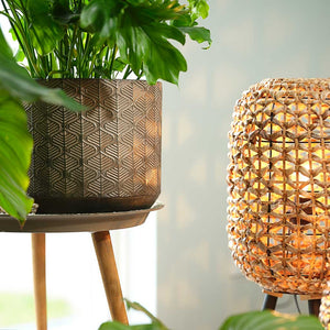 Jort Metal Plant Pots Set of 4 Shiny Brown with Plants Lifestyle